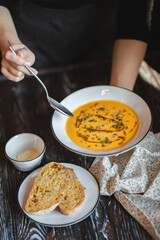 Food photography. Gazpacho on a dark wood background