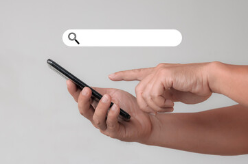 Businessman touching a smartphone on a white background to enter a word and search from a web browser. technology and copy space concept.