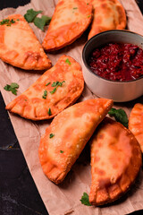 Fried mini pasties, with red sauce, top view, close-up, no people, selective focus,