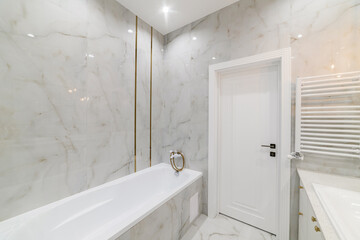 Fototapeta na wymiar bathroom interior design with light tiles