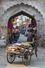 Shopkeepers and traders among the streets of the Indian city of Rishikesh on an ordinary day