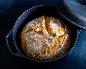 Baking bread at home in a cast iron pot

