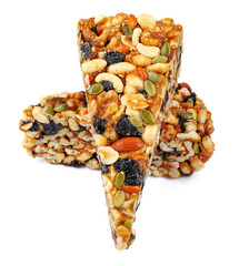 Two pieces of gozinak from different nuts isolated on white background.