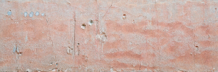 old plaster wall background and texture with holes and cracks, panoramic web banner