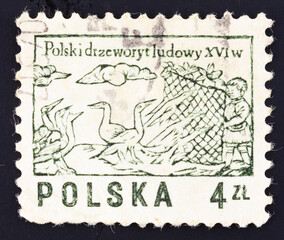 Postage stamp 'Boy snaring geese' printed in Poland. Series: 'Designs from 16th century woodcuts', 1977