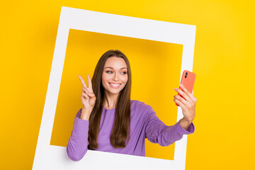 Photo of positive pretty blogger stand inside white image make self portrait picture snapshot...