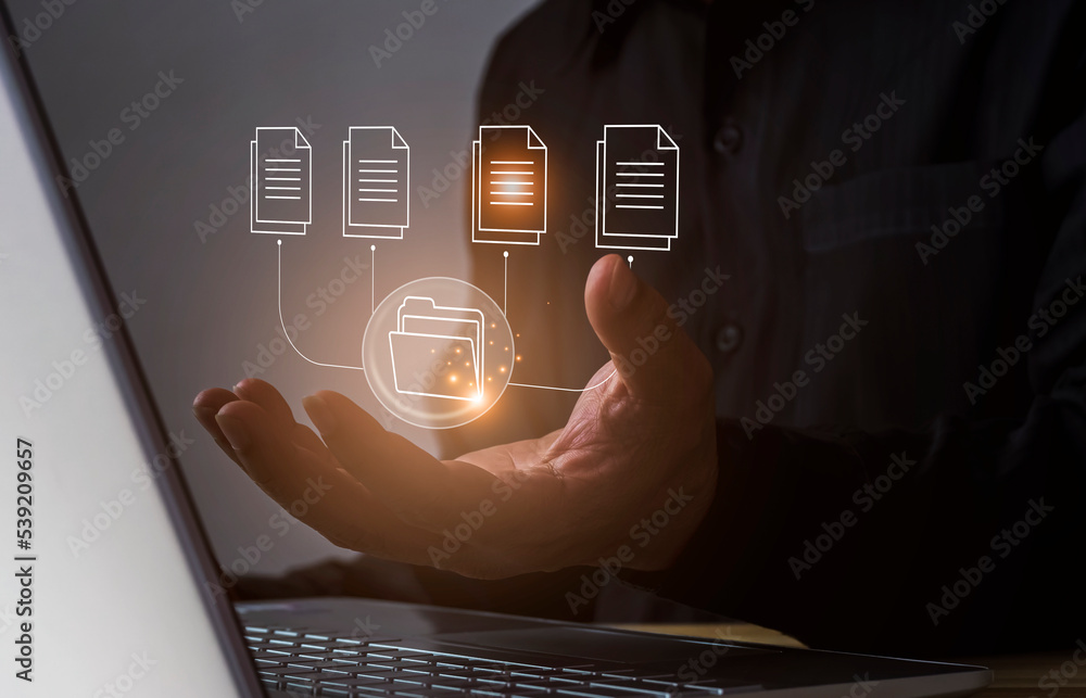 Wall mural hands of a businessman using a laptop with big data icons data analysis concept storage and manageme