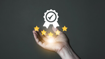 The customer's hand gives a five-star rating. service rating Satisfaction Concept Guarantee