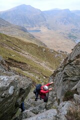 Scotland, Snowdonia. Hiking and climbing ridges through the wilderness during Spring time. Some days are sunny some days are rainy, but all of them are an adventure

