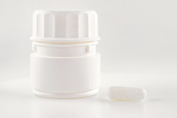 Medical capsules with white color bottle. Medical preparations. Health