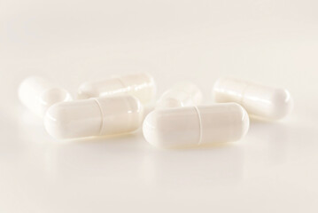 Medical capsules, pills on a white background close-up. Medical drug. Health. Treatment