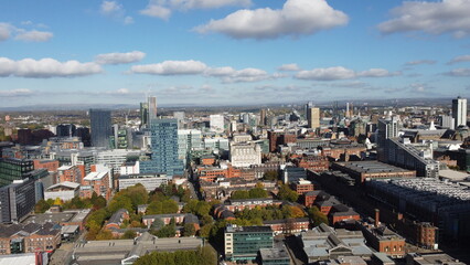 Aerial view of Manchester City centre with modern buildings and landmarks. 