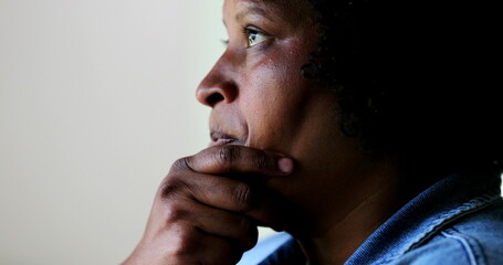 Anxious black woman, worried pensive African person