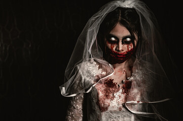 Halloween festival concept,Asian woman makeup ghost face,Bride zombie charactor,Horror movie...