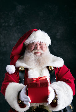 Santa Claus Holds Fancy Present