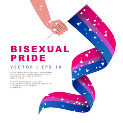 A long flag of bisexual pride in a man's hand. Sexual identification.