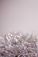 christmas festive background silver tinsel with copy space