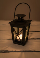old lantern candle burning 