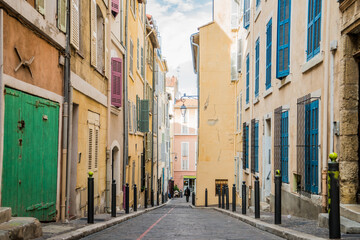 old looking empty colorful street in a city center.