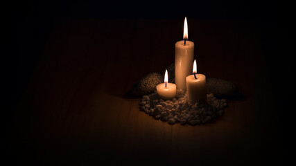 Background image of three candles lit in the dark. 