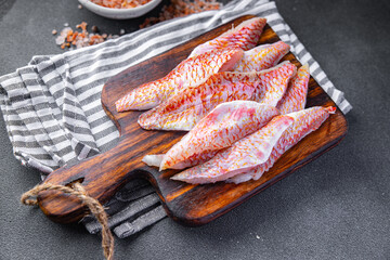 red mullet fillet seafood tropical fish snack meal food snack on the table copy space food...