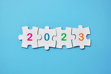 Puzzles with the inscription: cohesion. A symbol of the unity of