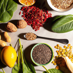 Healthy food clean eating selection fruit, vegetable, seeds, superfood, cereal, leaf vegetable on...