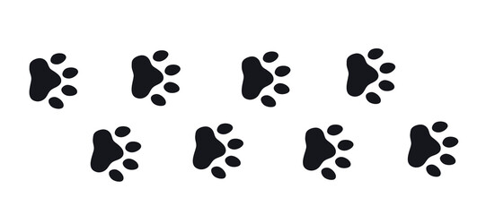 Silhouette of cat paws. Paw prints. The dog and cat puppy icon. Traces of a pet. The puppy's paws are highlighted on a white background.