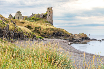 Fototapeta na wymiar The ruins of the 13th century Dunure Castle, used in the filming of Outlander, Dunure, South Ayrshire, Scotland UK