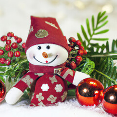 Christmas ornaments. Commemorative date with Santa Claus. Gifts, balls and Christmas tree. Christmas mood and decoration with lights. Xmas. Selective focus
