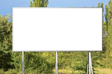 Blank advertising signboard with trees on background - concept with copy space for text inserting