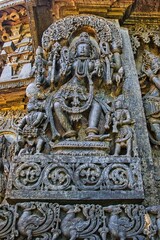 Fototapeta na wymiar Beautiful Soft Rock Sculptures of Helebid, Karnataka. Historical Hoysala monument representing Indian art and history