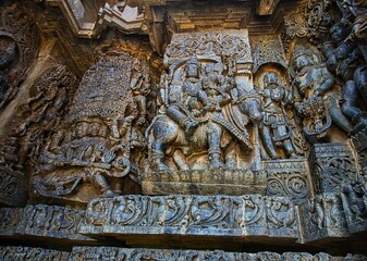 Shiva, Parvati and Nandi Soft Rock Sculptures of Belur,  Karnataka. Historical Hoysala monument representing Indian art and history
