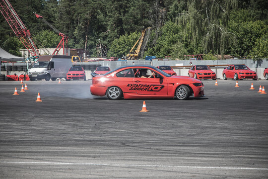 22.07.2022. Moscow. Russian Federation. The racing car is driving along the track. Drift competition. Nice and fast car. Racing track.