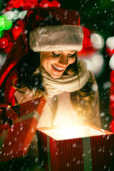 Woman opening gift box