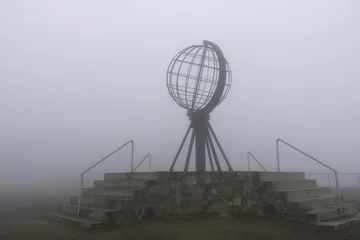 Dekokissen the Nordkapp North Cape globe symbol on a foggy day © Dynamoland