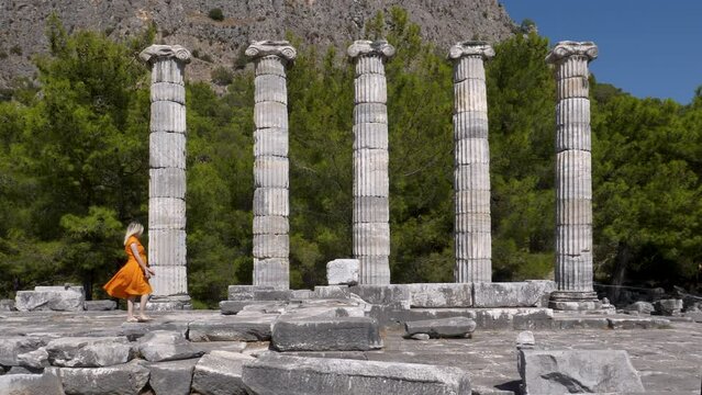 View of historical ruins, columns, ancient theater and temples in the ancient city of Priene.
