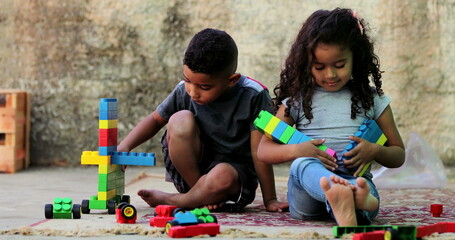 Hispanic children playing with toys. south american Brazilian kids play toy