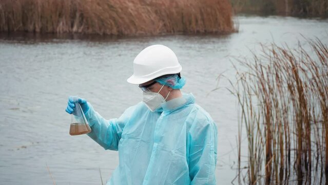 Conserve Water And Environment, Cientist Wearing Protective Uniform And Glove Under Working Water Analysis Determine Level Of Contamination And Pollution.