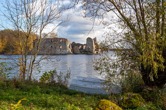 View to the castle ruins from river coast in Koknese in October in Latvia