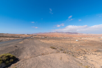Desert landscape with mountains terraine. Caldera of an ancient volcano.