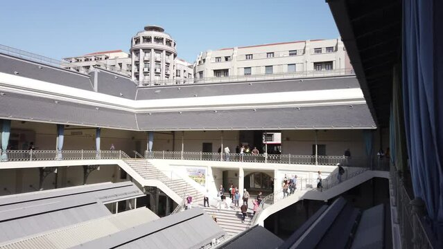 Porto, Portugal, October 4, 2022: PAN SHOT - Shoppers at the Mercado Bolhao Market. The historic market, whose origins date back to 1838, underwent a &ldquo;demanding&rdquo; renovation project.