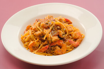 Pasta Jambalaya with tomato served in a dish isolated on background side view of fastfood
