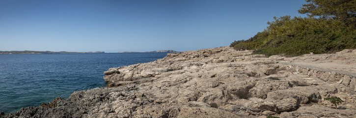 Fototapeta na wymiar rocks, coast, sea, sant antoni, , ibiza, spain, balearic Islands, Mediterranean Sea, panorama, 