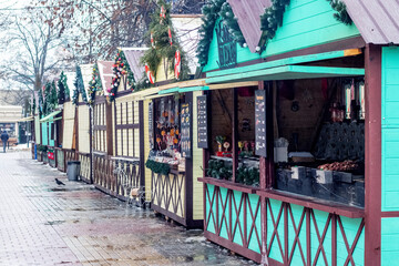 Festively decorated houses, stalls on the town square during Christmas markets in Khmelnytskyi, Ukraine