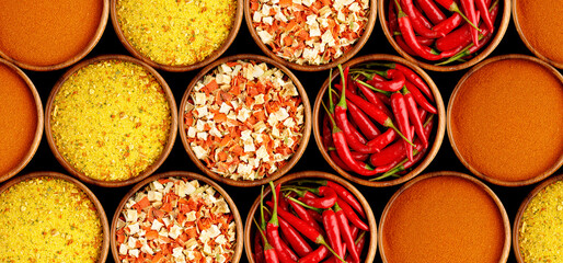 pepper spices on black background