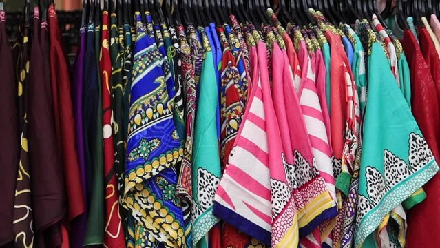 close up of many women cloths display for sale 