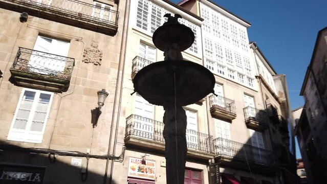 Ourense, Spain, August 25, 2022: DOLLY - The Blacksmiths&rsquo; Square fountain. Before the ecclesiastical Confiscation, it used to decorate the courtyard of the monastery of San Esteban de Ribas de Sil.