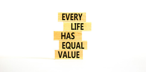 Every life has equal value symbol. Concept words Every life has equal value on wooden blocks. Beautiful white table white background. Business and every life has equal value concept. Copy space.