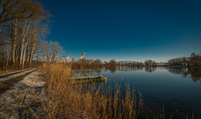 Sunny sunrise morning in frosty cold place near ponds in south Bohemia